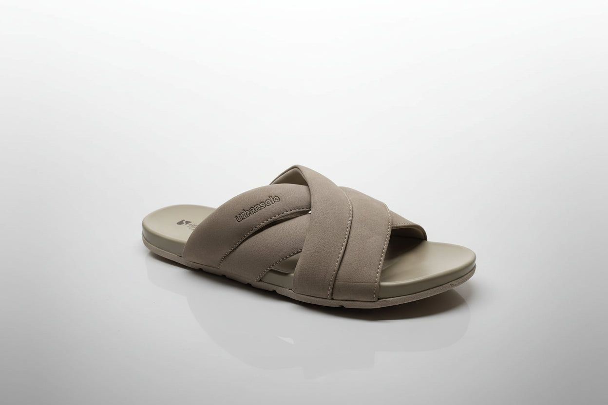 Beige sandal with 'Urban Slide' branding on a white surface