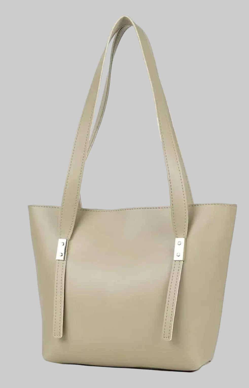 Beige handbag with a strap on a white background