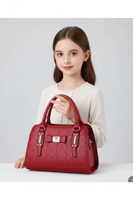 Woman holding a red handbag against a light gray background