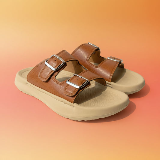 Brown sandals with buckles on a light background