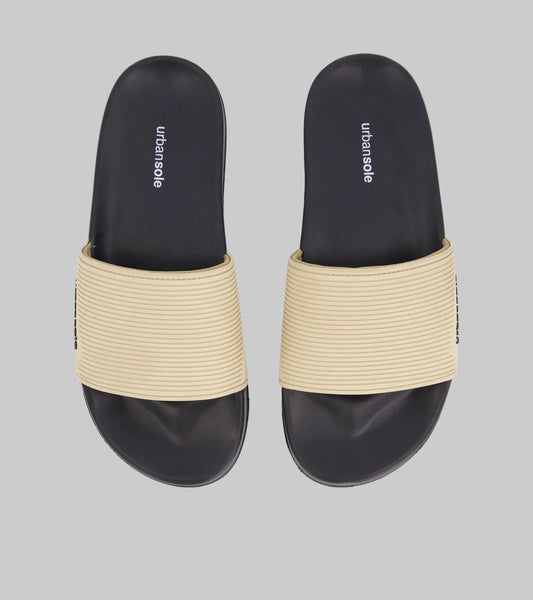 Pair of black and beige sandals with 'urbansole' branding on a white background