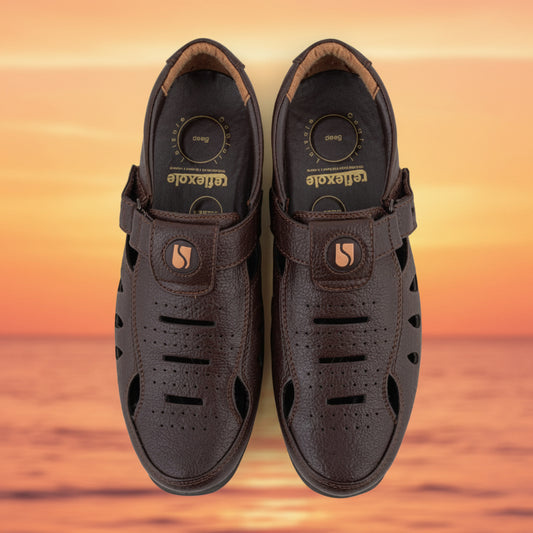 Pair of brown sandals on a white background