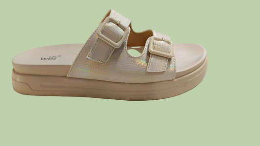 Beige sandal with velcro straps on a white background