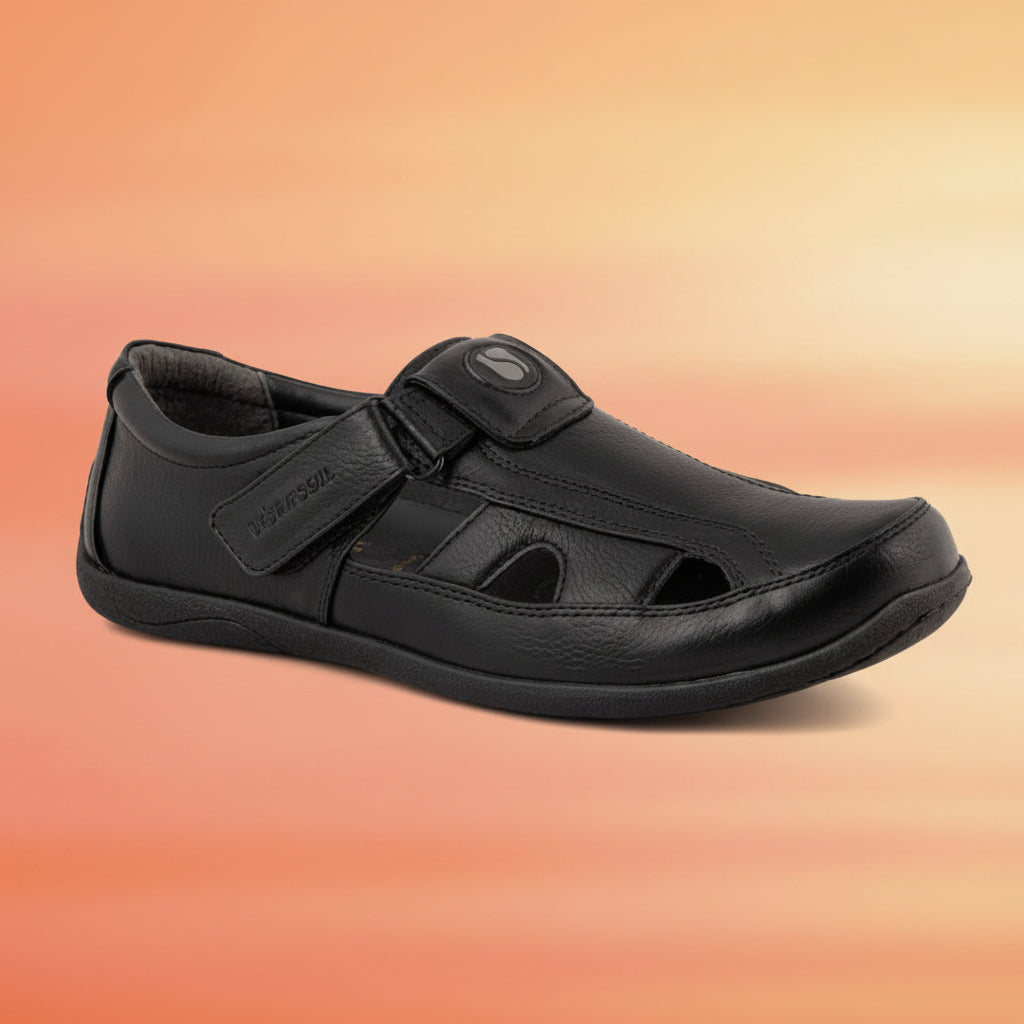 Black sandal with a strap on a white background