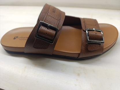 Brown sandal with buckles on a white background