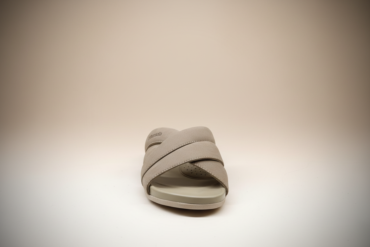 Beige sandal with 'Urban Slide' branding on a white surface