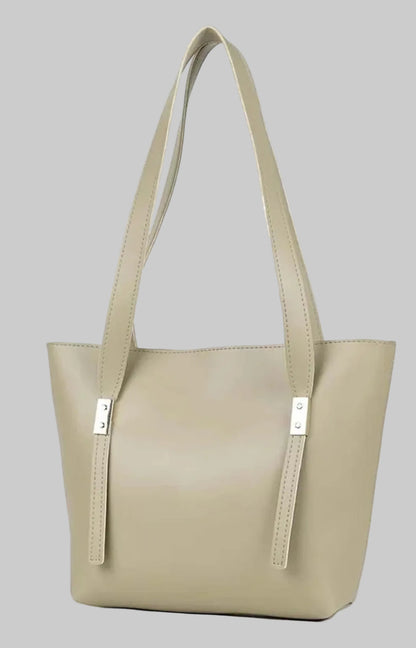 Beige handbag with a strap on a white background
