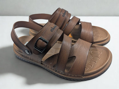 Brown sandal with multiple straps on a light gray background