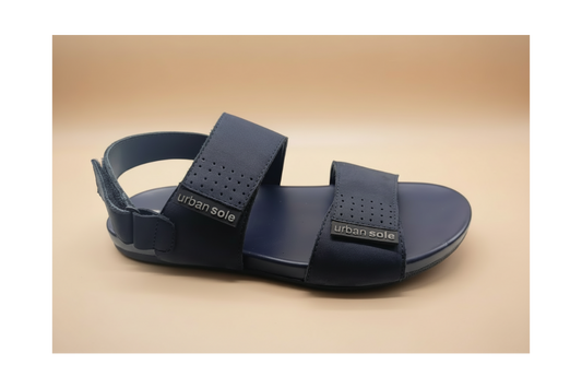 Navy sandal with 'urban sole' branding on a beige background