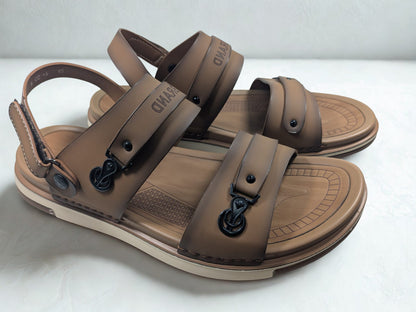Brown sandals with black straps on a white background