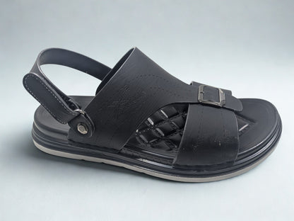 Black sandal with a strap on a light gray background
