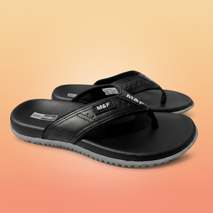 Black sandals with a brand logo on a white background