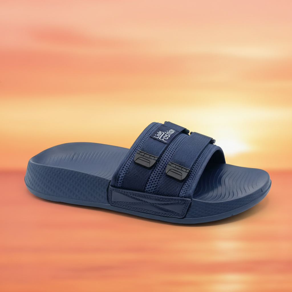 Navy blue slide sandal with velcro straps on a white background