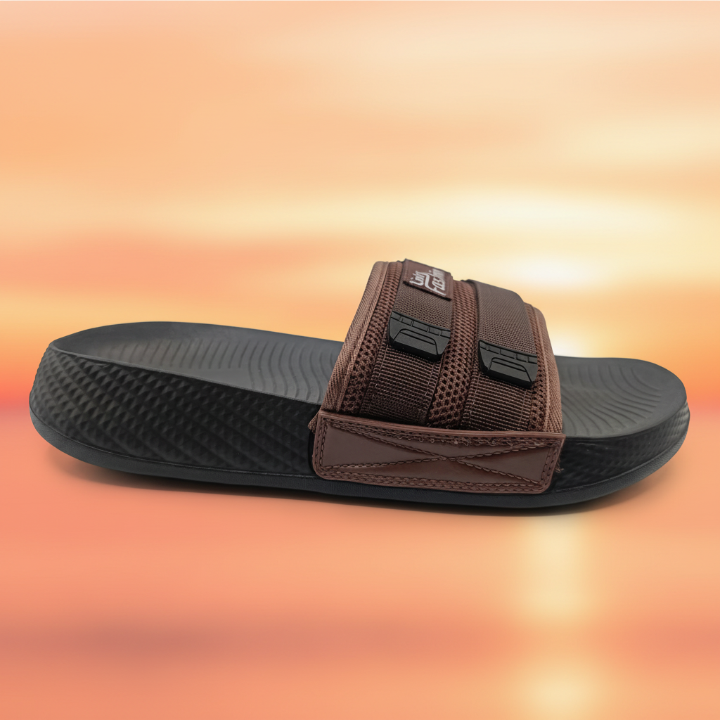 Brown and black slide sandal on a white background