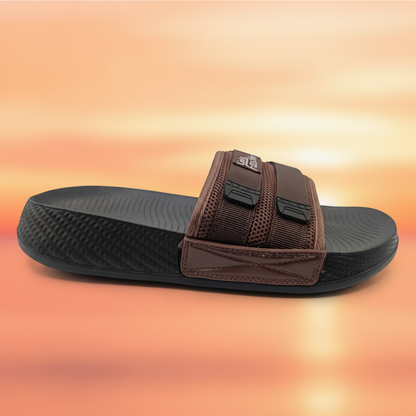 Brown and black slide sandal on a white background