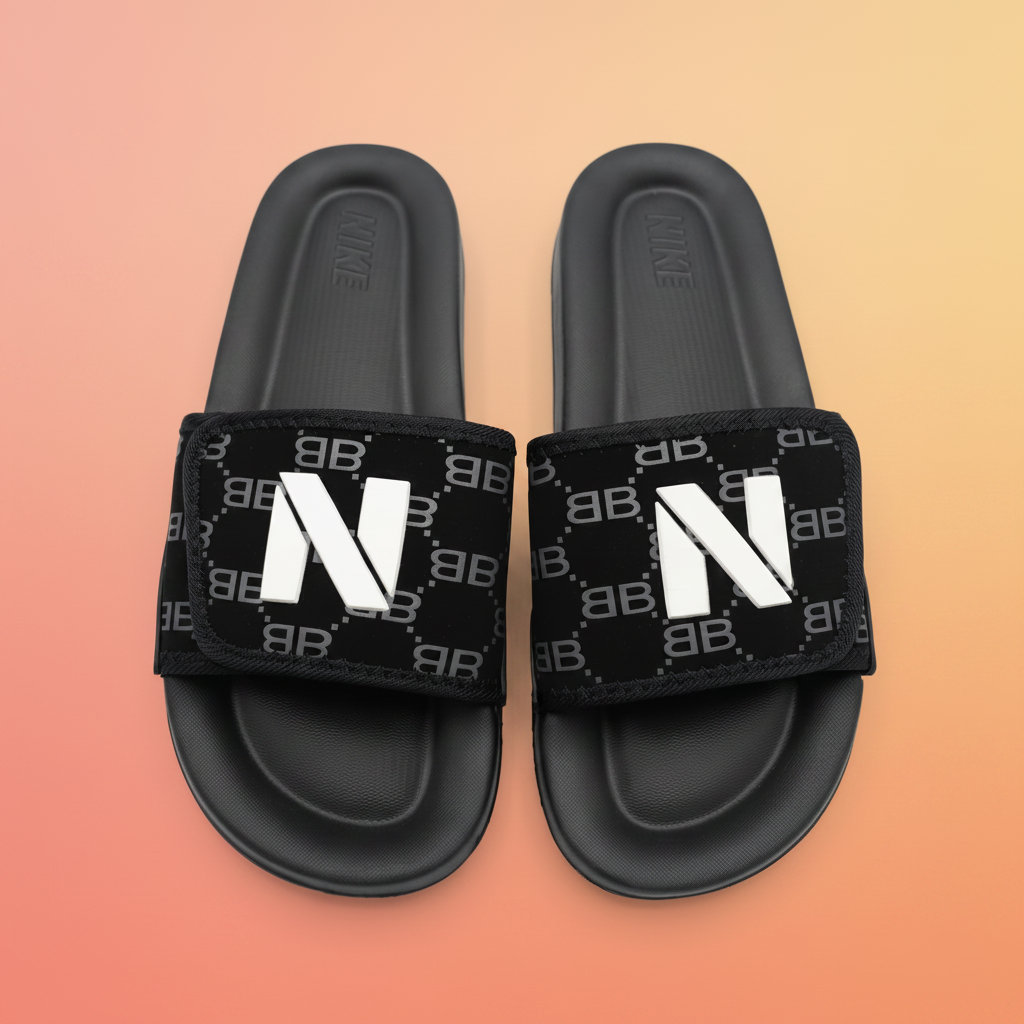 Black slides with 'BB' logo on straps on a white background