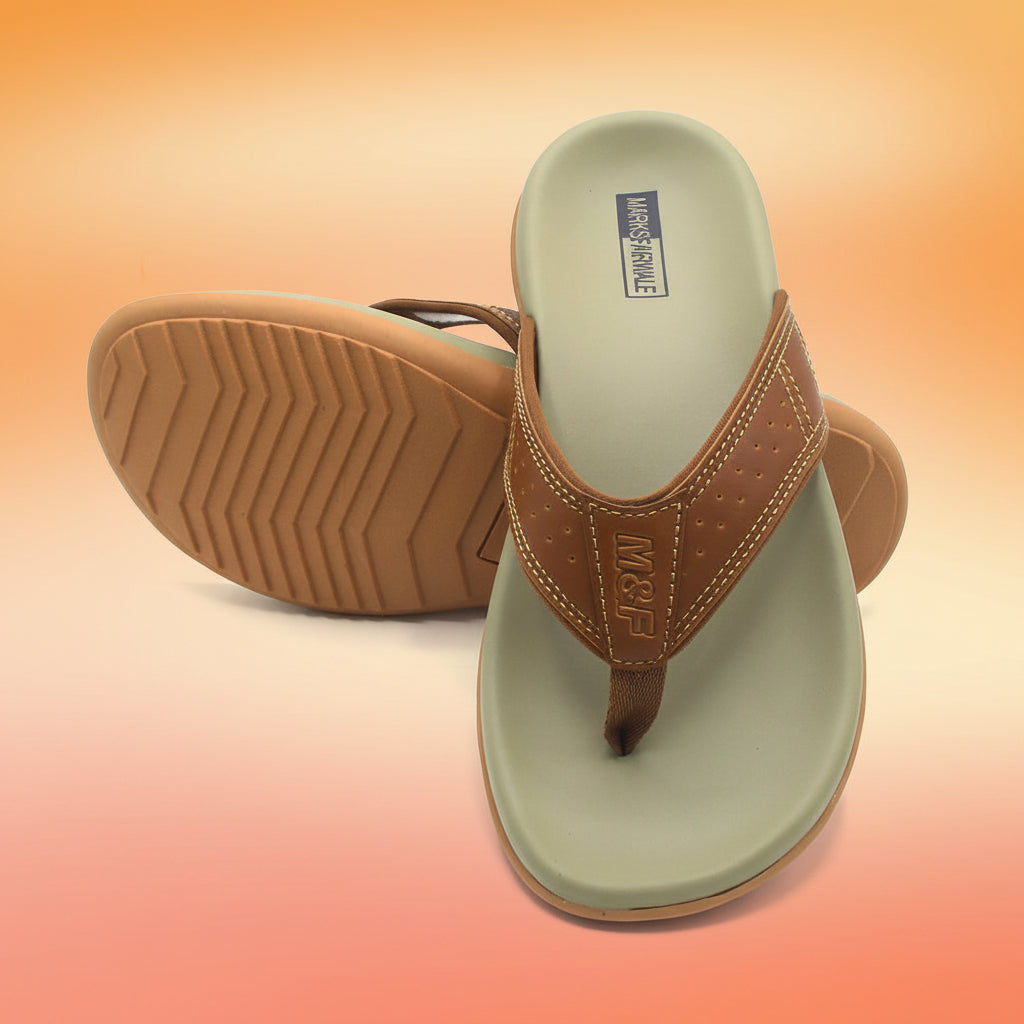 Pair of sandals with brown straps and soles on a white background