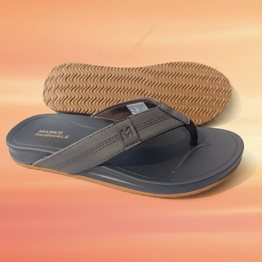 Gray sandal with brown sole on a white background