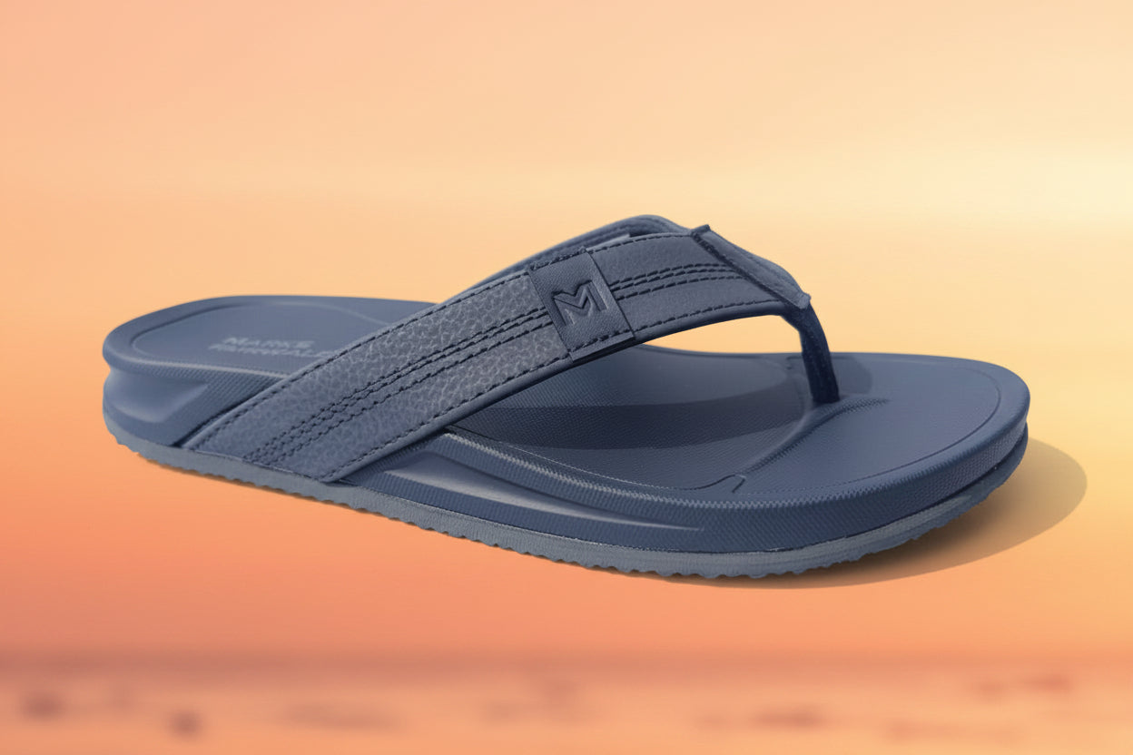 Navy blue sandal with a brand logo on a white fabric background