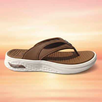 Brown sandal with white sole on a light gray background