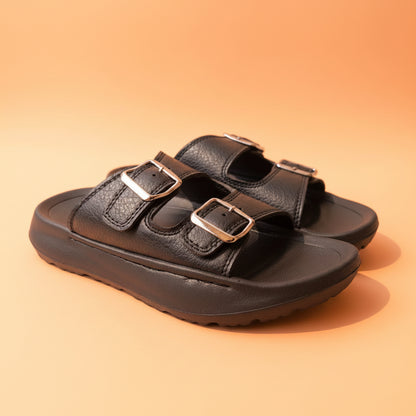 Black sandal with double straps on a white background