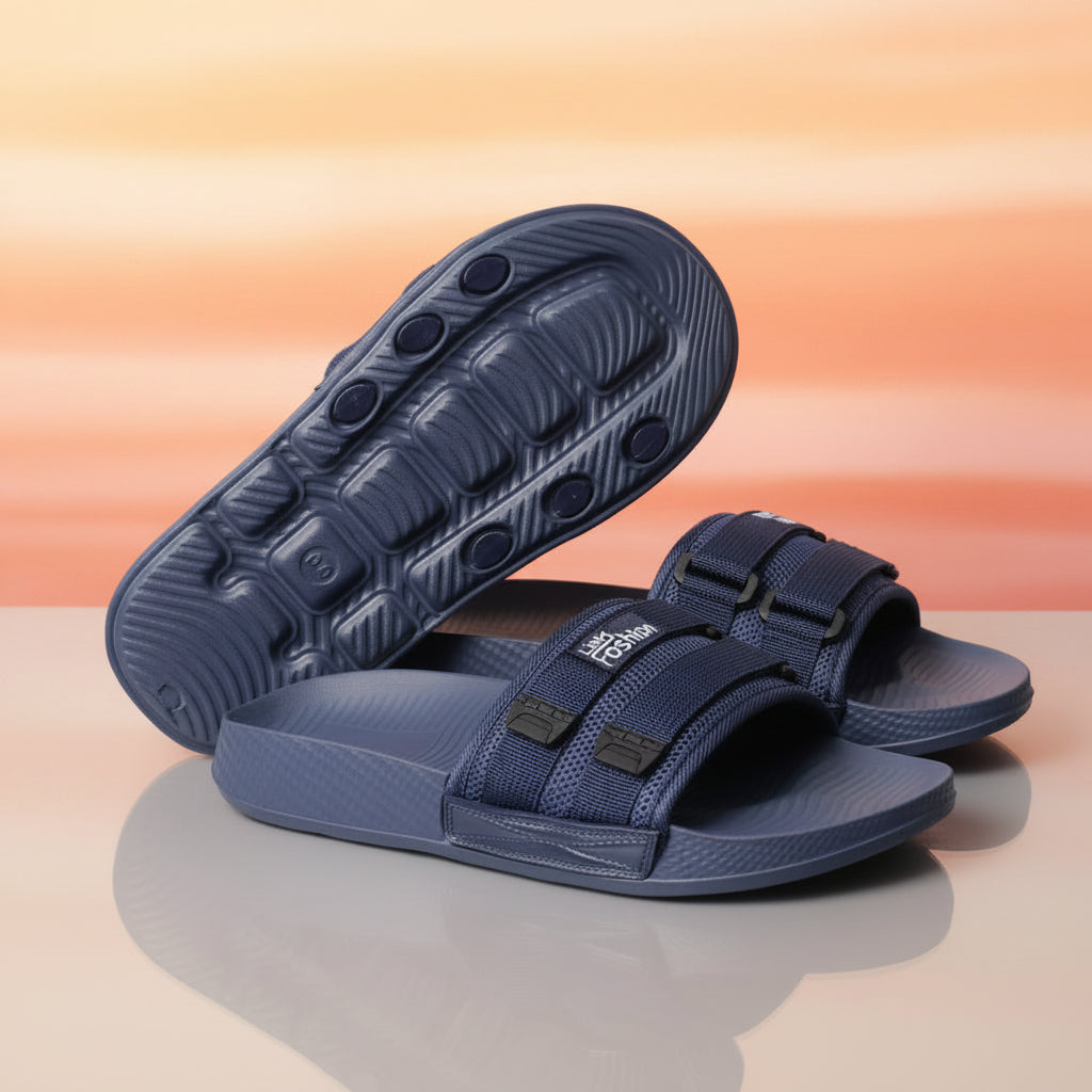 Blue slide sandals with a strap on a white fabric background
