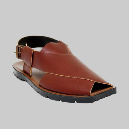 Brown leather sandal with a black sole on a white background