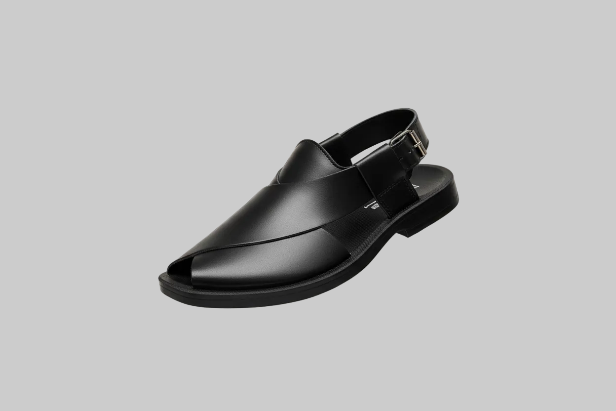 Black shoe floating in a shopping mall with blurred store fronts and people in the background