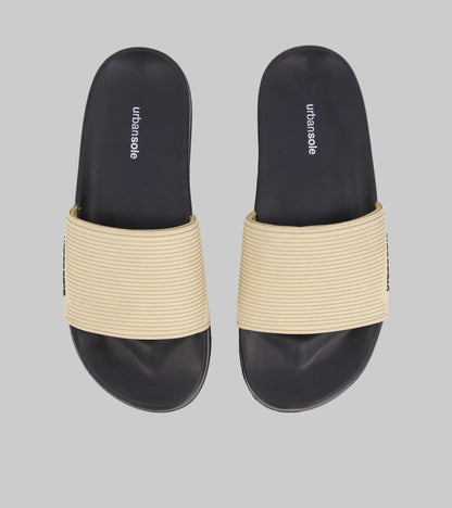 Pair of black and beige sandals with 'urbansole' branding on a white background