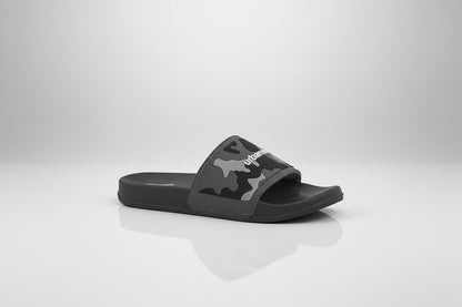 Black slide sandal with camouflage pattern and brand logo on a white background