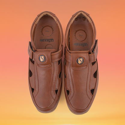 Pair of brown slip-on shoes with a visible brand logo on a white background