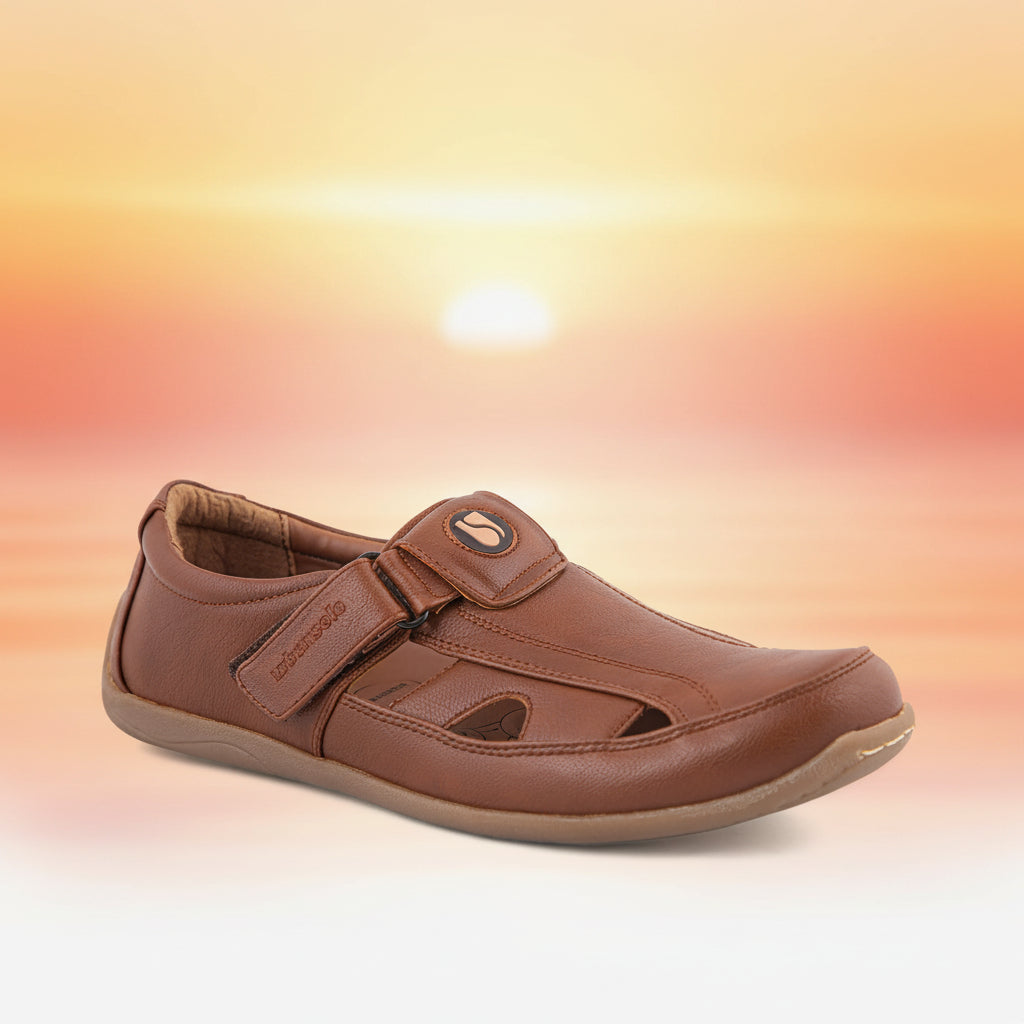 Brown leather sandal with a strap on a white background