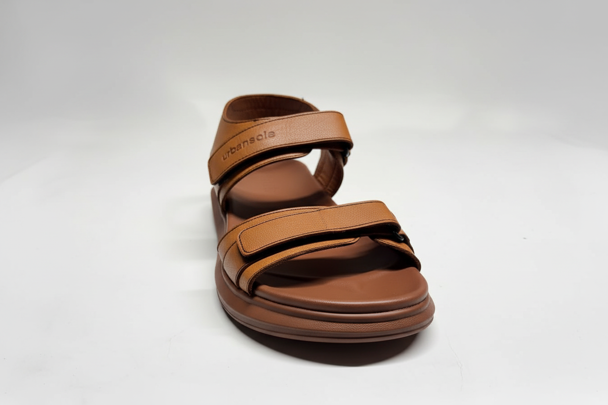 Brown sandal with 'Urbano' branding on a white background