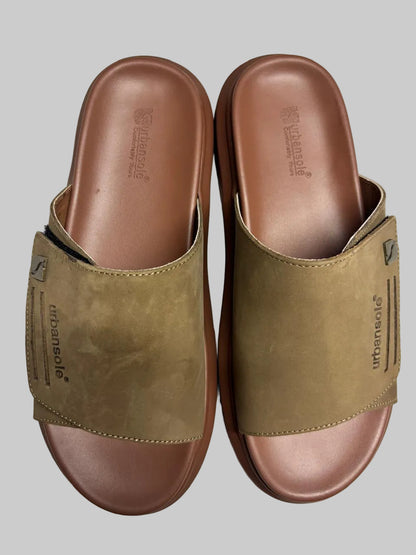 Pair of brown sandals with a visible brand logo on a white background