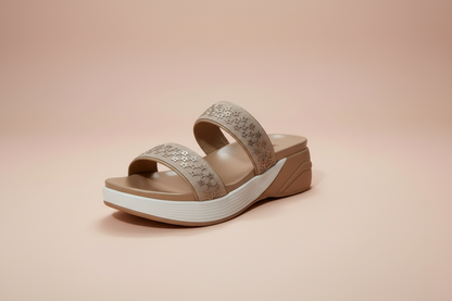Beige sandal with white sole on a beige background