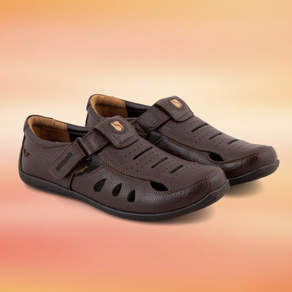 Pair of brown sandals on a white background