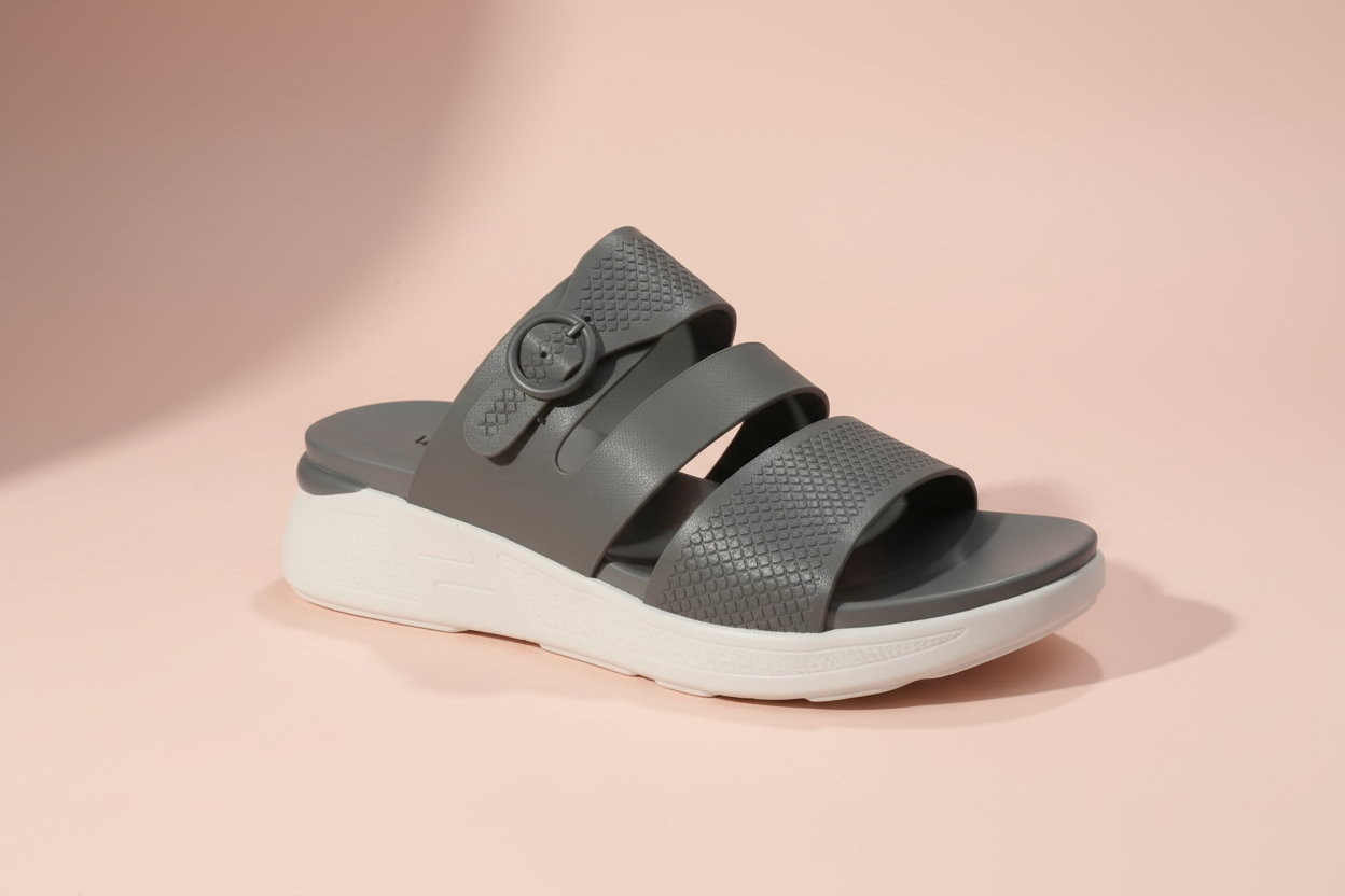 Gray sandal with a white sole on a light gray background