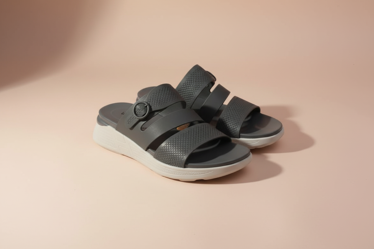 Pair of gray sandals on a light-colored floor